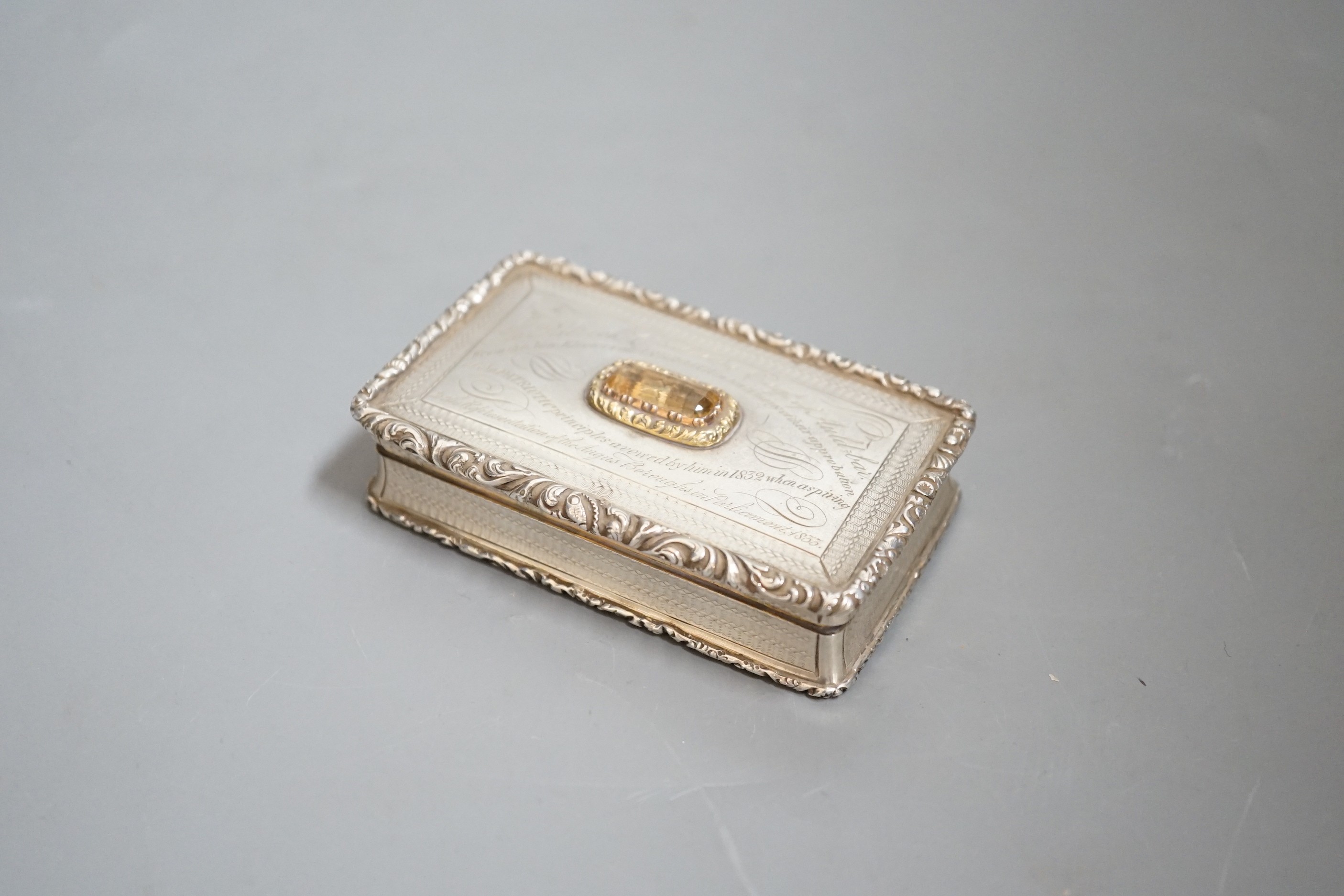 A William IV silver and citrine mounted rectangular snuff box, by Nathaniel Mills, Birmingham, 1830, with engraved inscription, 83mm.